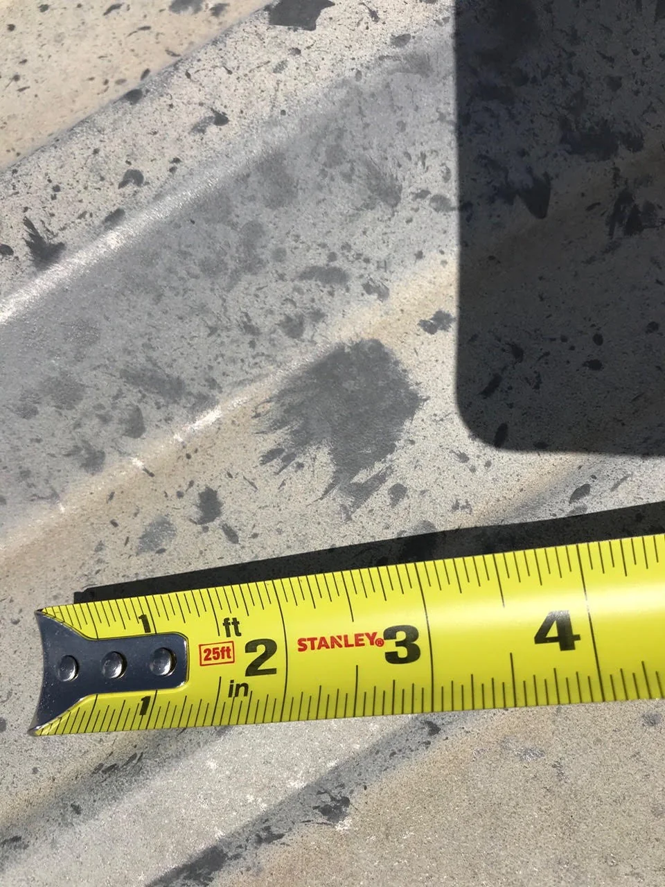Fotografía de una inspección de propiedad para documentar condiciones pertinentes a la reclamación